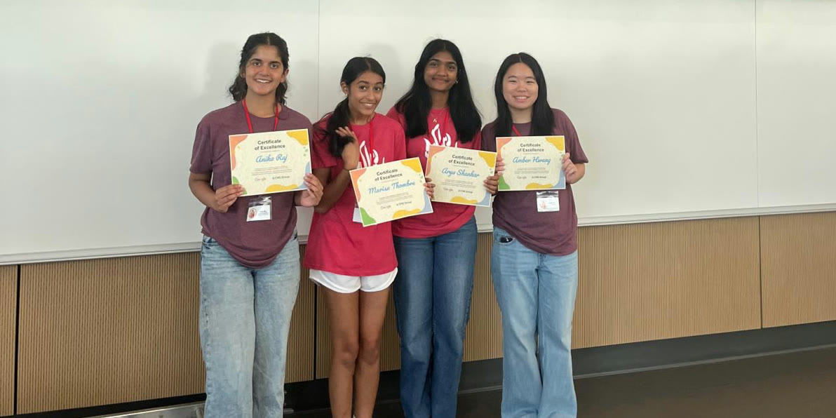 Anika and her three EyeAssist teammates holding certificates of excellence from the CME Group and Google Innovation Challenge
